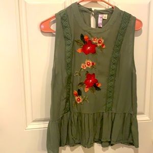 Alyte top in sage green with pink embroidery floral embellishment.